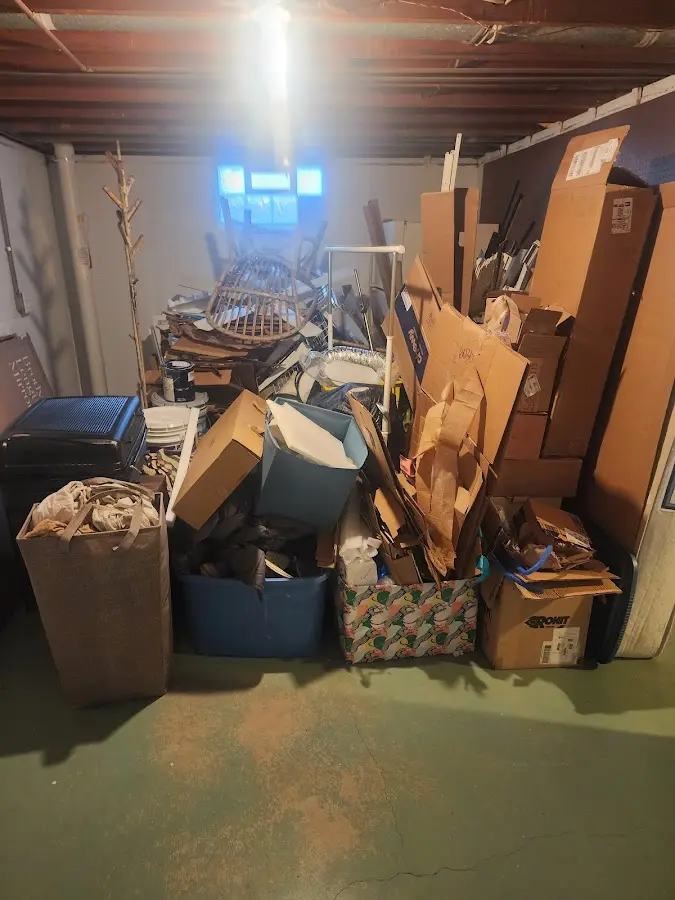 Roll-off dumpster container at job site for 4 Yard Dumpster Rental in Bedford